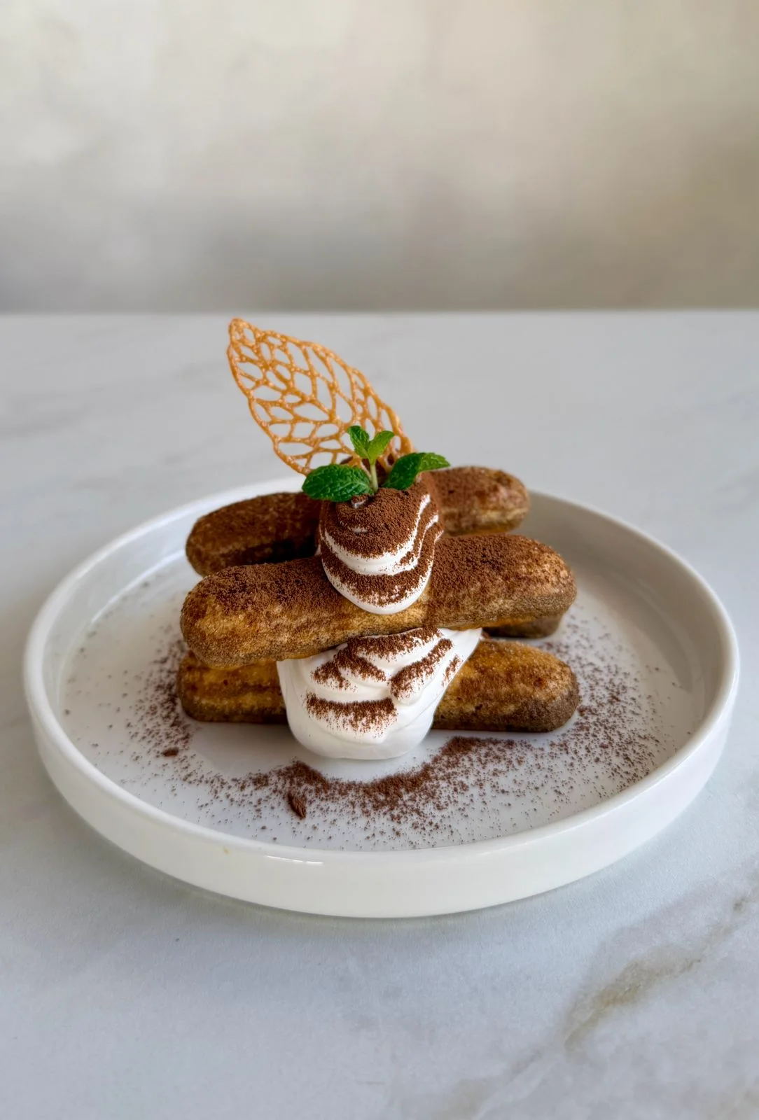 Deconstructed Tiramisu at Cafe OneTen — savoiardi biscuits, mascarpone, cocoa dusting