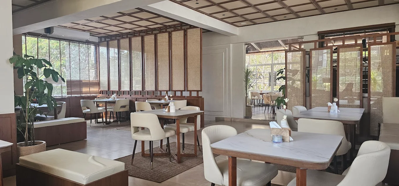 Cafe OneTen spacious dining area with large windows and natural light