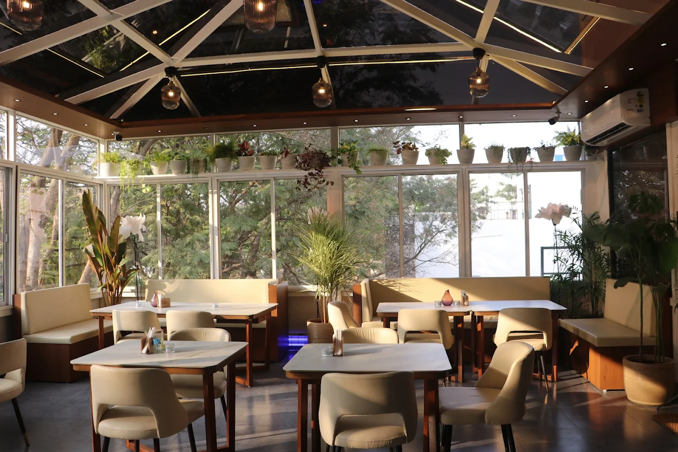 Cafe OneTen glass-roofed Gazebo terrace with plants and open sky